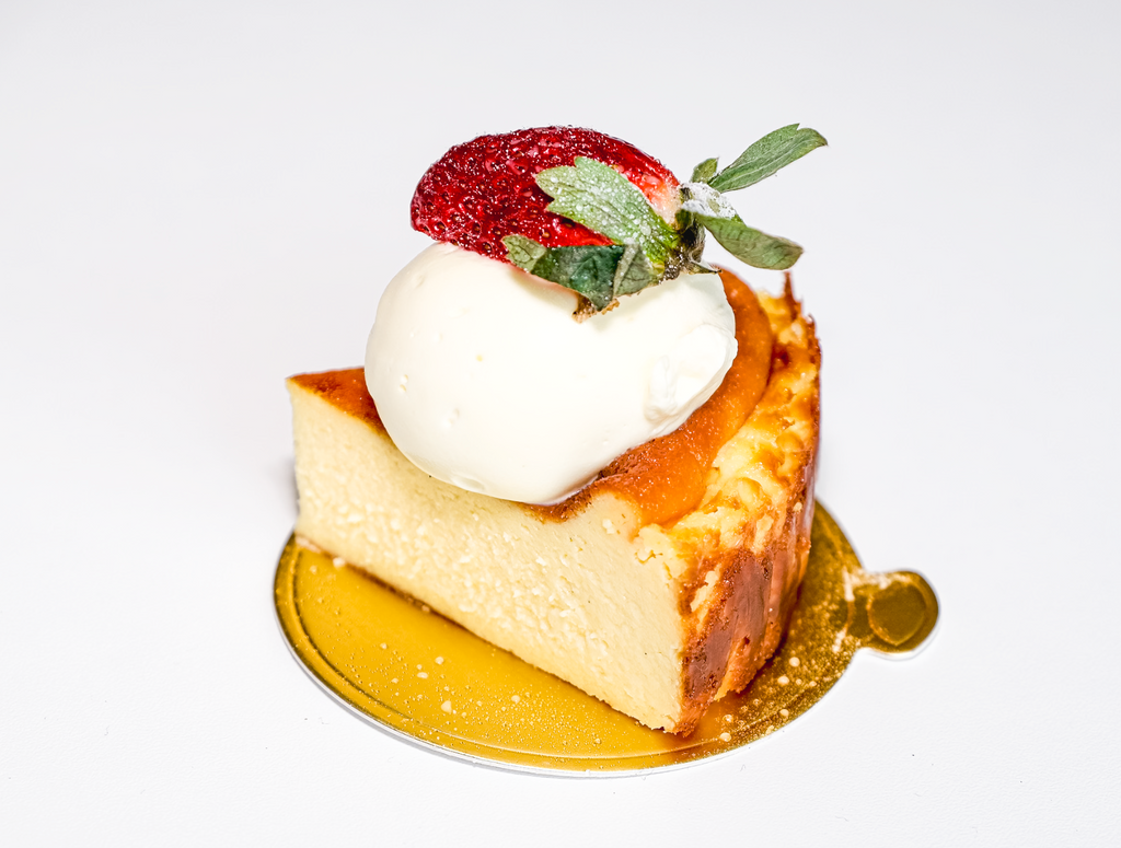 The original Basque burnt cheesecake — caramelised top, jiggly custard centre. 8" cake, Gluten Free. Christchurch pickup & delivery.