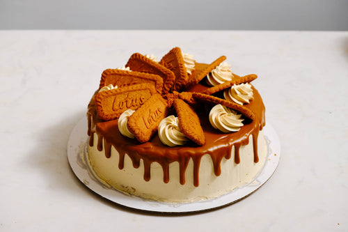 Biscoff cookie butter buttercream sponge cake — spiced, caramelly and addictive. 8" cake, 48hr pre-order. Christchurch.