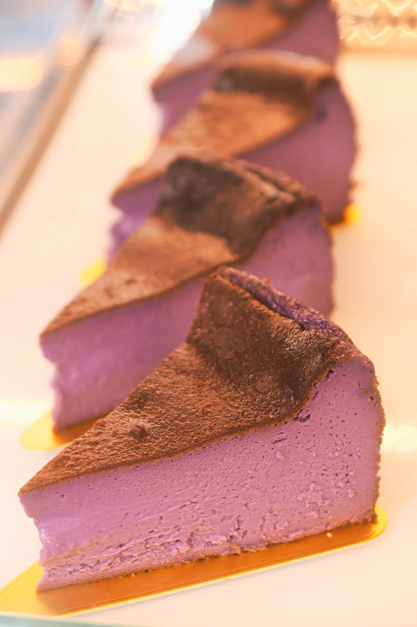 Purple ube basque burnt cheesecake — sweet, creamy and stunning. 8" cake, 48hr pre-order. Christchurch pickup & delivery.