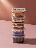 Blue Moon Bakehouse Whānau Box — four assorted dessert boxes packed to share, bakery's pick of the range