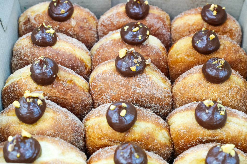 Choose 5 artisan donuts made fresh in-house: Mocha, Pistachio, Salted Caramel, Lemon Meringue, Matcha Strawberry & more. 24hr pre-order. Donut Box Christchurch | Blue Moon Bakehouse