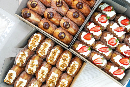 Choose 5 artisan donuts made fresh in-house: Mocha, Pistachio, Salted Caramel, Lemon Meringue, Matcha Strawberry & more. 24hr pre-order.