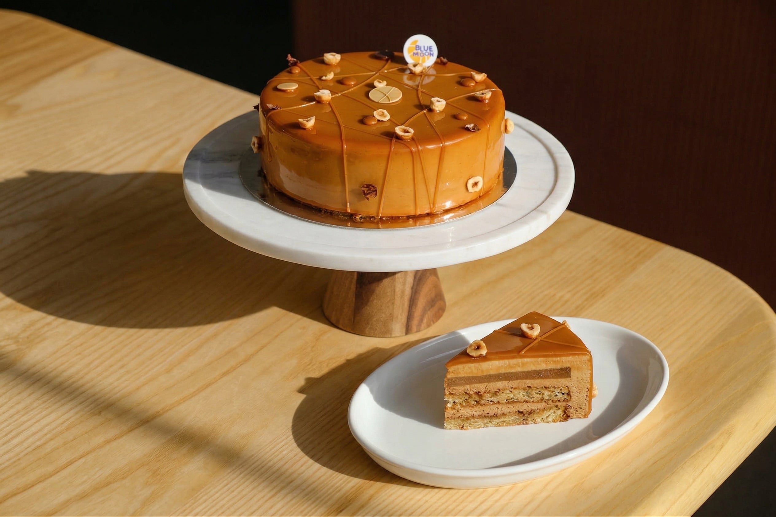 8 inch hazelnut caramel mousse cake with four handcrafted layers from Blue Moon Bakehouse Christchurch
