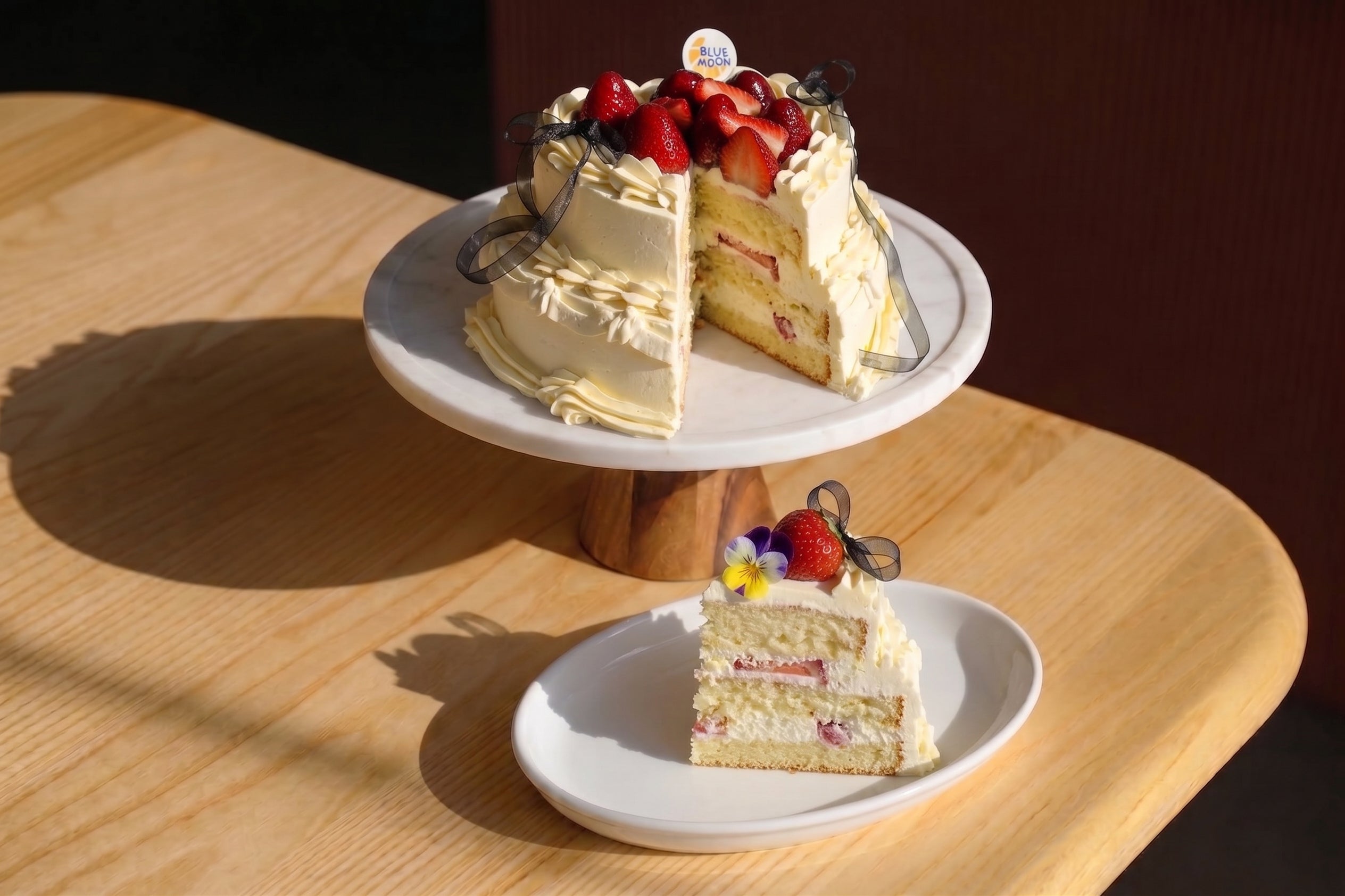A strawberry shortcake with vanilla buttercream, by christchurch bakery Blue Moon Bakehouse, with premium looks and high quality ingredients only.